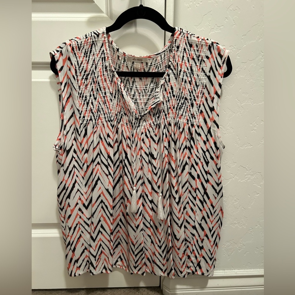 Ella Moss top in size large. Black , coral, and white color pattern.